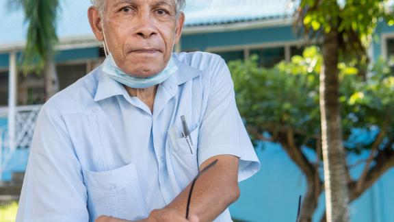 Dr. Stewart McKoy, sitting outside of the Beth Jacobs Family Clinic