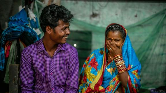 Young couple and clients.